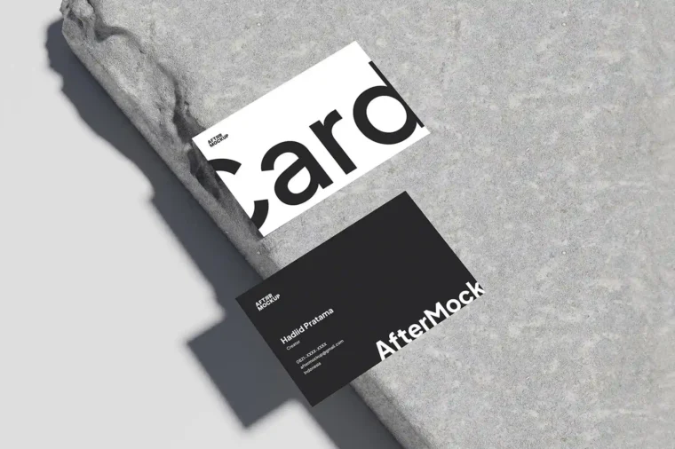 Business card mockup on concrete background for professional brand presentations.