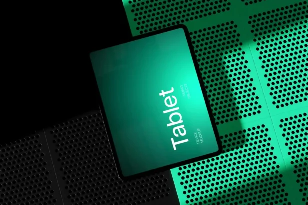 M4 iPad Pro 13 mockup in landscape orientation with glowing green screen on a perforated surface, perfect for showcasing UI or app design.