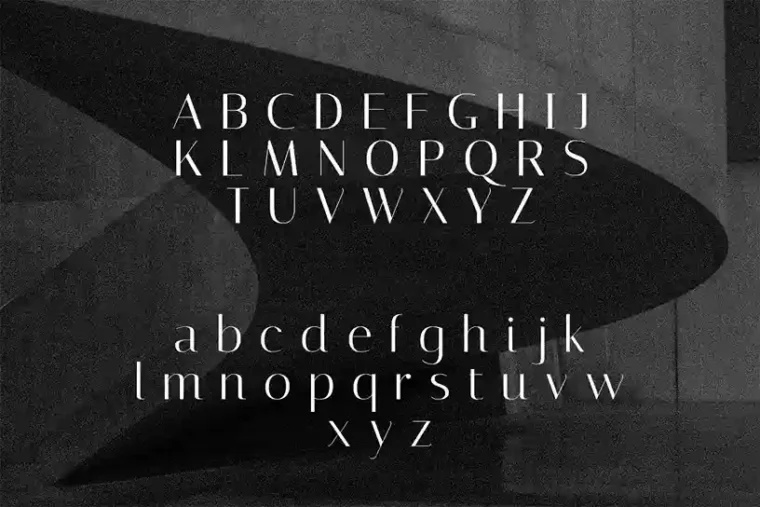 Italiana font showcasing uppercase and lowercase letters, numbers, and punctuation in a stylish serif typeface.