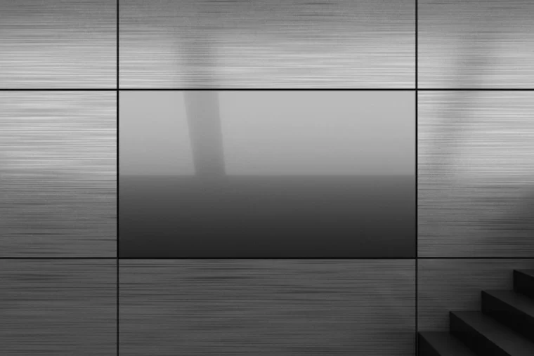 Brushed metal wall mockup with blank LED display for UI previews